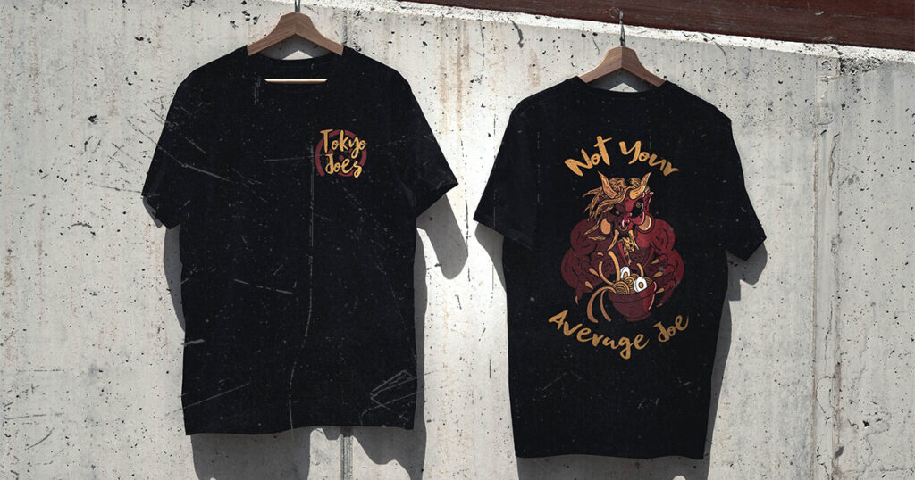 Front and back view of Tokyo Joe’s limited-edition employee t-shirt featuring “Not Your Average Joe” graphic with ramen monster illustration